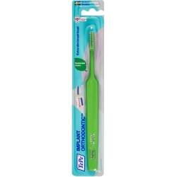implant - orthodontic toothbrush